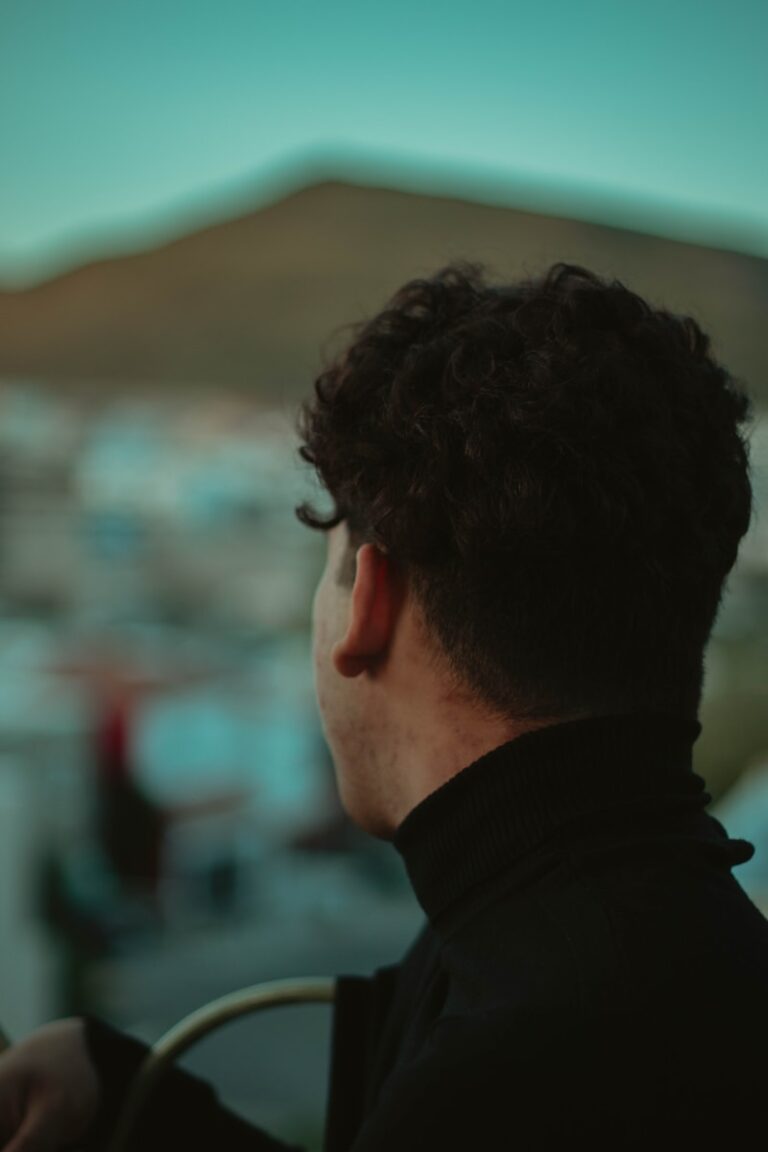 man wearing black turtleneck top during daytime